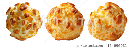 Small cheesy bread ball with golden crust and holes, isolated on white background, concept of Brazil Pao de Queijo food 134696981
