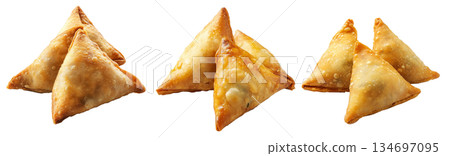 Golden brown crispy samosas isolated on white transparent background, traditional Indian snack concept 134697095