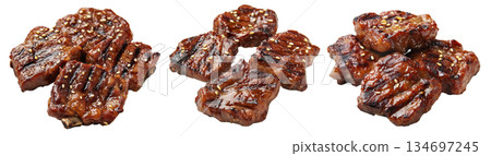Glazed grilled pork ribs Tteokgalbi with sesame seeds, isolated on white transparent background. Concept of barbecue Glazed grilled pork ribs Tteokgalbi with sesame seeds, isolated on white transparent background. Concept of barbecue 134697245