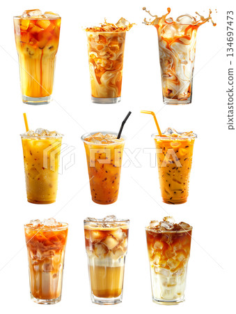 Refreshing milkshake or Thai iced tea in glass with straw isolated on white transparent background Refreshing milkshake or Thai iced tea in glass with straw isolated on white transparent background 134697473