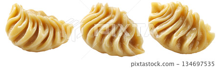 Set of Steamed Banana dumplings with intricate twisted edges, isolated on white background. Concept of Asian cuisine and food art Set of Steamed Banana dumplings with intricate twisted edges, isolated on white background. Concept of Asian cuisine and food art 134697535
