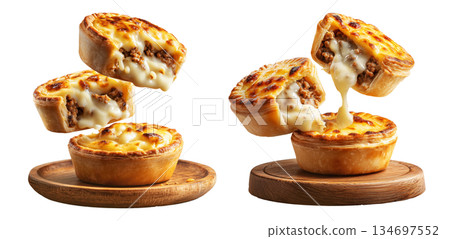 Set of mince and cheese pie with golden brown crust, mashed potato and cheese topping on white background, New Zealand fast food 134697552