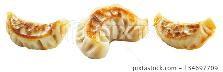 Pan-fried or steamed dumplings Jiaoz with golden crispy bottoms, isolated on white background, concept of Asian cuisine 134697709