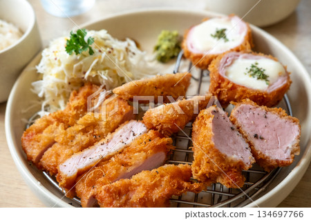 Sous vide pork katsu. Tonkatsu including loin, fillet and cheese katsu. Fried Pork serve on plate in restaurant Sous vide pork katsu. Tonkatsu including loin, fillet and cheese katsu. Fried Pork serve on plate in restaurant 134697766