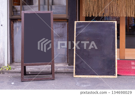 Large blank billboard on a street wall, banners with room to add your own text Large blank billboard on a street wall, banners with room to add your own text 134698029