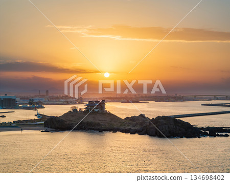 Aerial view of the evening sky and Kabushima Island in Aomori Prefecture, Hachinohe City 134698402