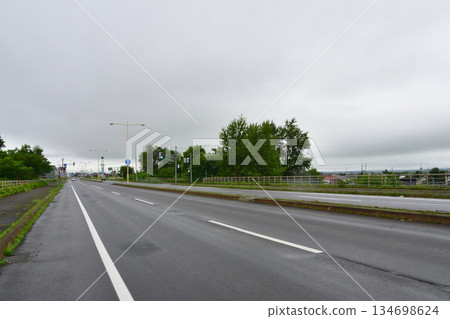 Scenery of National Route 12, the longest straight road in Japan 134698624