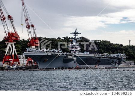 The USS George Washington, a nuclear-powered aircraft carrier with fighter jets aboard, is docked at Yokosuka Naval Base in Kanagawa Prefecture. 134699236