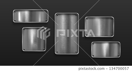 Shiny metal plates set isolated on background Shiny metal plates set isolated on background 134700057