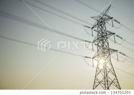 A view of electric poles on sunset time A view of electric poles on sunset time 134701201