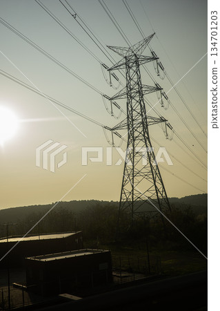 A view of electric poles on sunset time A view of electric poles on sunset time 134701203