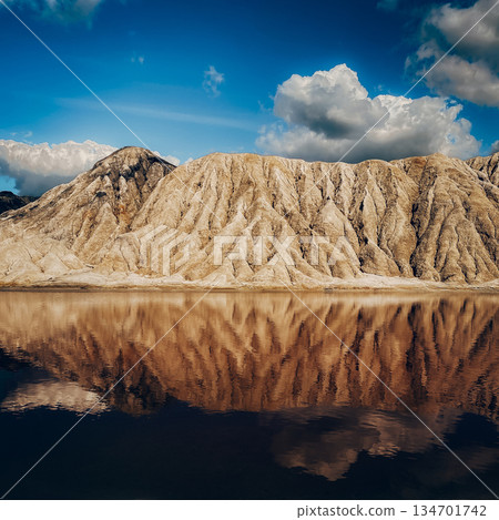 Beautiful landscape with a lake in a clay quarry Beautiful landscape with a lake in a clay quarry 134701742