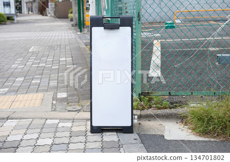 Large blank billboard on a street wall, banners with room to add your own text Large blank billboard on a street wall, banners with room to add your own text 134701802