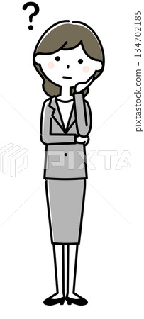 Hatena pose: Young woman in a suit wondering 134702185