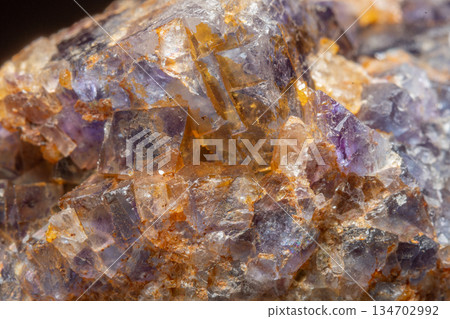 Mineral formation with fluorite crystals found in rock in middle of natural environment Mineral formation with fluorite crystals found in rock in middle of natural environment 134702992