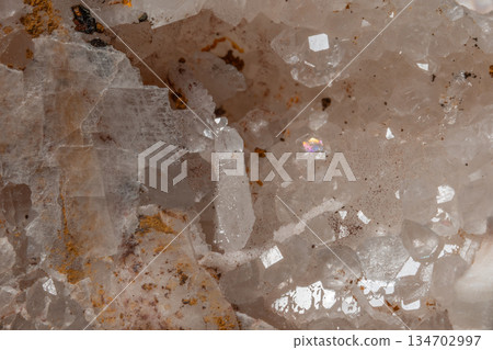 Surface of clear minerals with crystals and reflections inside Surface of clear minerals with crystals and reflections inside 134702997