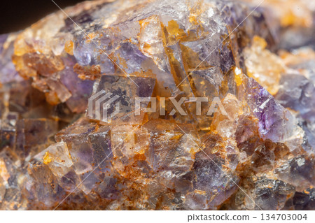 Mineral formation with fluorite crystals found in rock in middle of natural environment 134703004