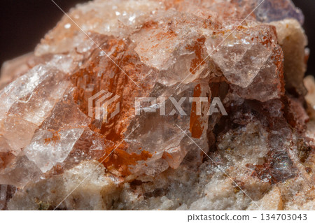 Mineral formation with fluorite crystals found in rock in middle of natural environment 134703043