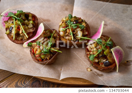 Indulgent Gourmet Appetizers Crafted with a Variety of Fresh Vegetables and Aromatic Herbs 134703044