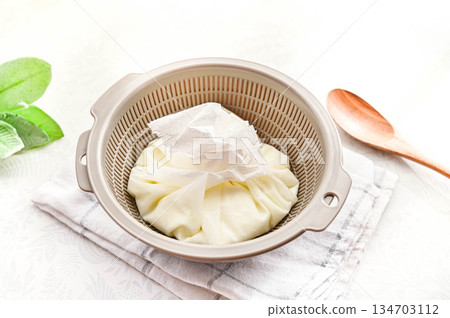 Draining cream cheese dough Draining cream cheese dough 134703112