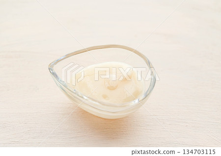 Strained Shio-Koji in a glass container 134703115