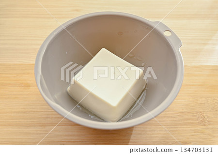 Silken filled tofu in a bowl Silken filled tofu in a bowl 134703131