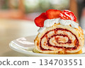 Swiss roll with strawberries. Cake slice cream with strawberry 134703551