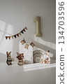 Animal themed party decorations, banner and large number one balloon set the stage for baby's first birthday celebration. 134703596