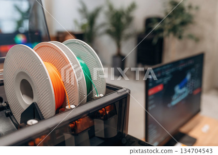 Plastic for a 3D printer in the office, close up view 134704543