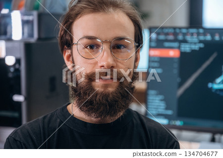 Portrait of man that is in the modern office, 3d printing designer Portrait of man that is in the modern office, 3d printing designer 134704677