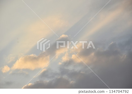 sunlight spreading through cloud on twilight sunset sky in evening sunlight spreading through cloud on twilight sunset sky in evening 134704792