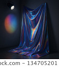 Iridescent fabric under spotlight 134705201