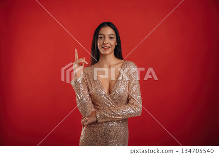 Young elegant woman is against background Young elegant woman is against background 134705540