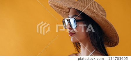 Young beautiful tourist woman is against background 134705605