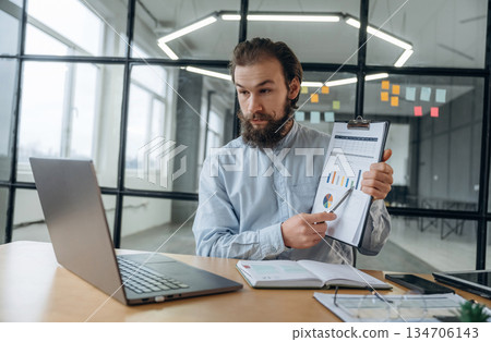 New plan, online conference. Businessman is working in the office 134706143
