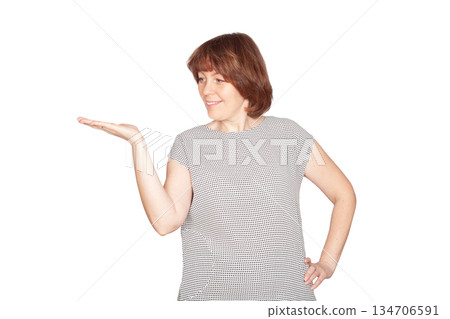 Smiling girl showing invisible product Smiling girl showing invisible product 134706591