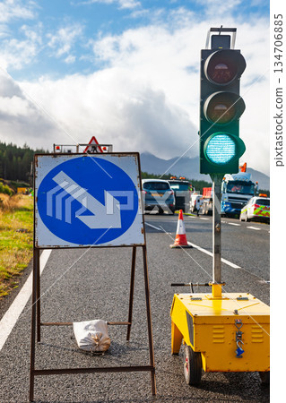 Temporary traffic lights and roadworks on rural highway 134706885