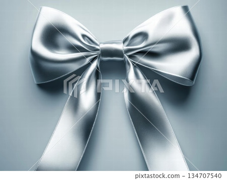 Elegant Silver Bow: A Symbol of Celebration and Grace Elegant Silver Bow: A Symbol of Celebration and Grace 134707540