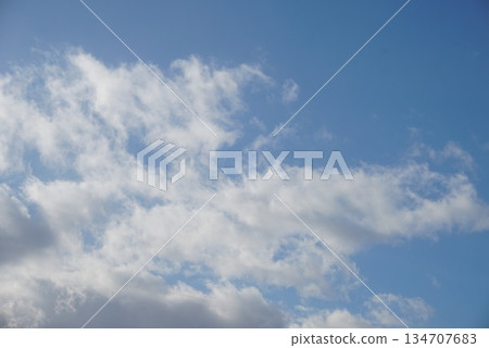 Clouds floating in the blue sky Clouds floating in the blue sky 134707683