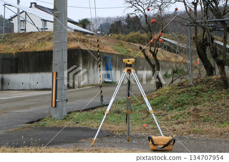 Surveying equipment installed at a construction site Surveying equipment installed at a construction site 134707954