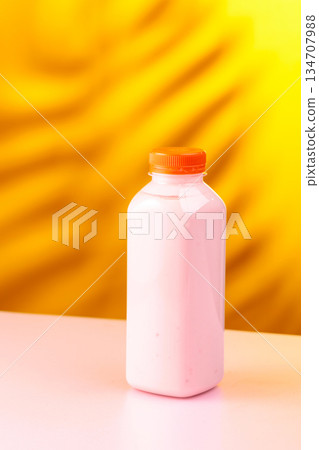 Strawberry milkshake smoothie in eco disposable jar. 134707988