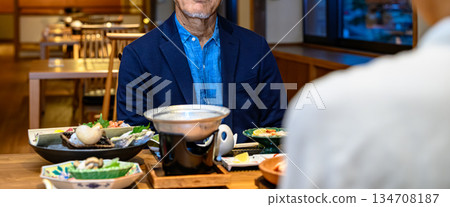 Dinner with an elderly man and Japanese food Dinner with an elderly man and Japanese food 134708187
