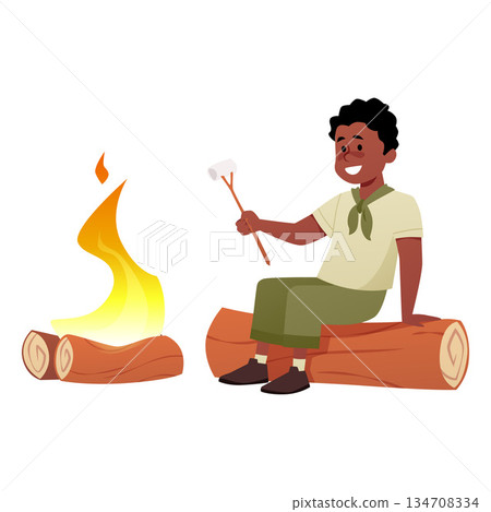 A happy boy scout sits on a log near a campfire with a marshmallow on a stick. 134708334