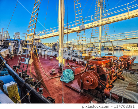 Working Ship Deck with Ladders and Maritime Machinery 134708381