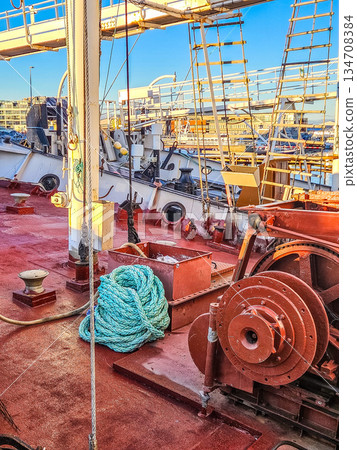 Ship Deck with Winch, Ropes and Industrial Maritime Equipment Ship Deck with Winch, Ropes and Industrial Maritime Equipment 134708384