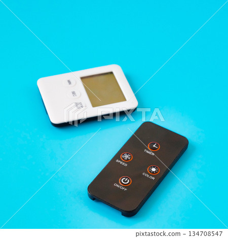Mini Remote control on color background. Mini Remote control on color background. 134708547