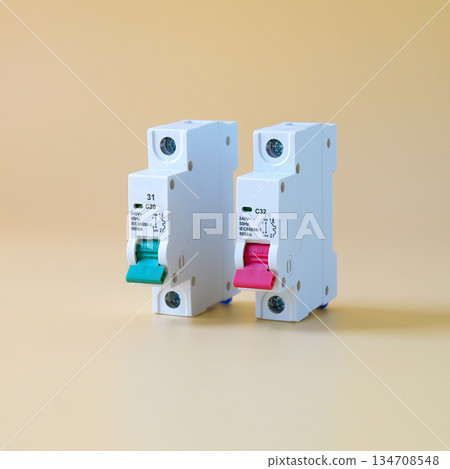 A circuit breakers during the assembly of an electrical panel. 134708548