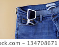 Sunglasses in blue jeans pocket,fashionable jeans. 134708671