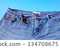 Black watch in blue jeans pocket.Fashion concept. 134708675