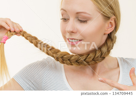 Blonde girl with braid hair 134709445
